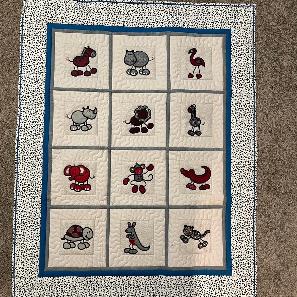 Beautiful handmade animal quilt for baby